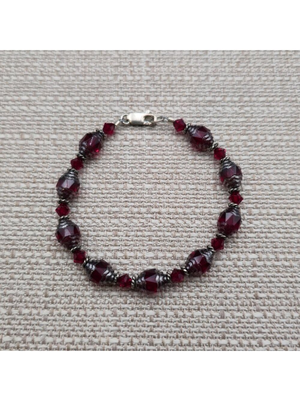7.5 Inch Sterling Silver Dark Red Crystal and Textured Bead Bracelet B1627